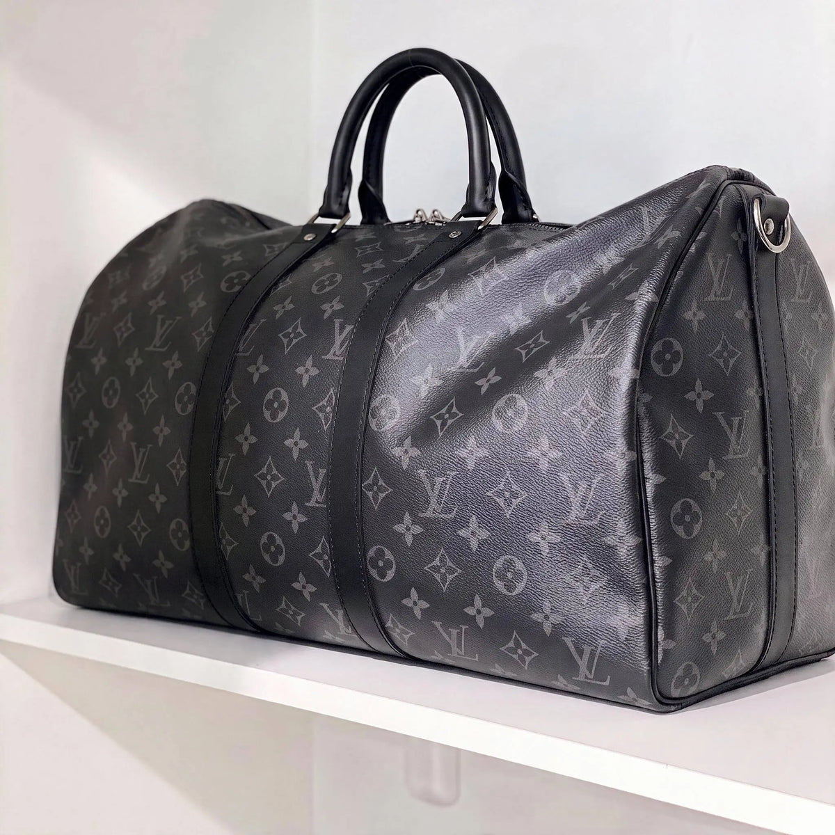 LV leather duffle bag