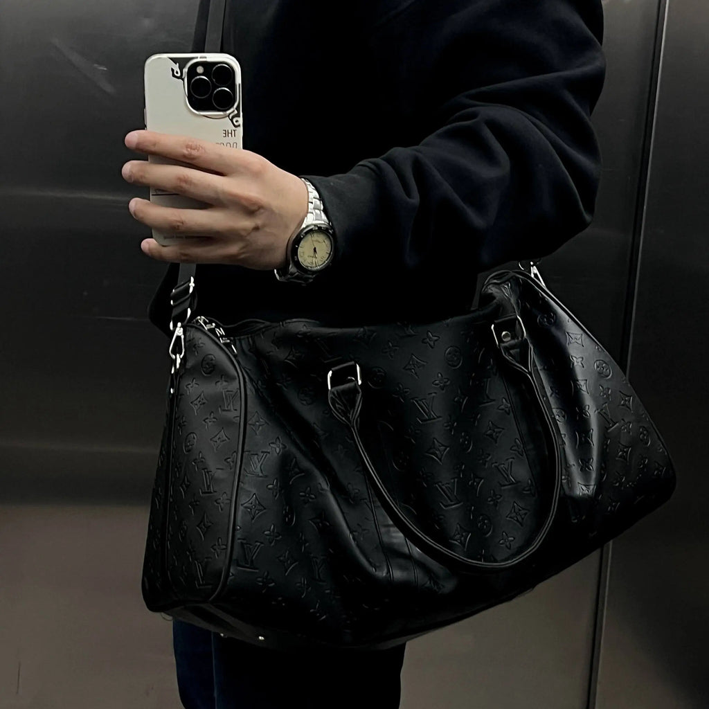LV leather duffle bag